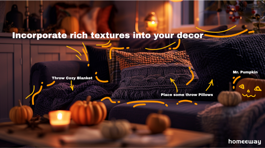 Halloween, featuring dark textured throws and pillows in shades of black, orange, and deep purple. Soft ambient lighting creates a warm atmosphere, with small pumpkins subtly placed on a rustic coffee table